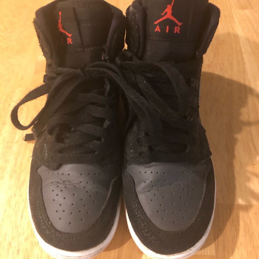 Nike Air Jordan high top sneakers black and gold